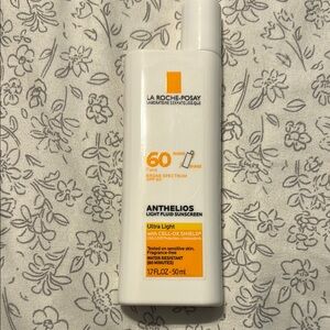 La Roche-Posay Anthelios Light Fluid Sunscreen SPF 60 - White and Orange